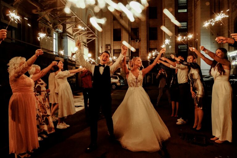 Wedding celebration with sparklers at night in Fontainebleau.