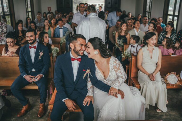 Wedding ceremony at Fontainebleau venue, joyful couple with guests.