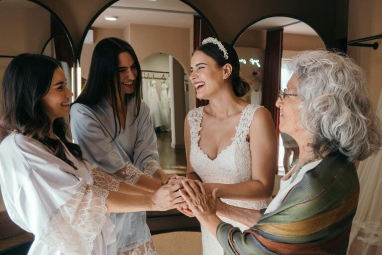 Bride with family members sharing joyful moments before the wedding.